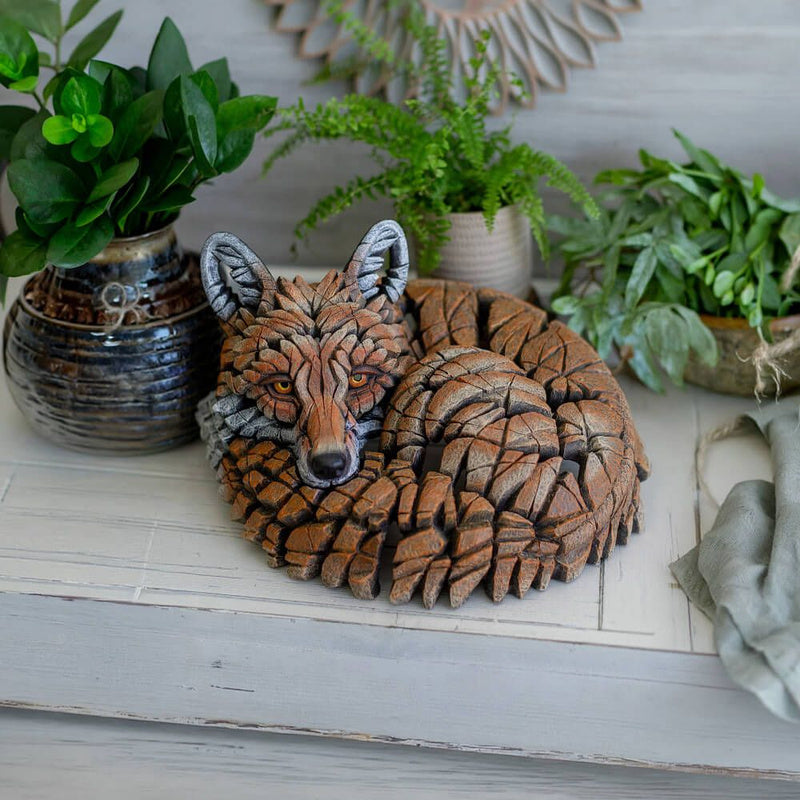Edge Curled Up Fox Figure